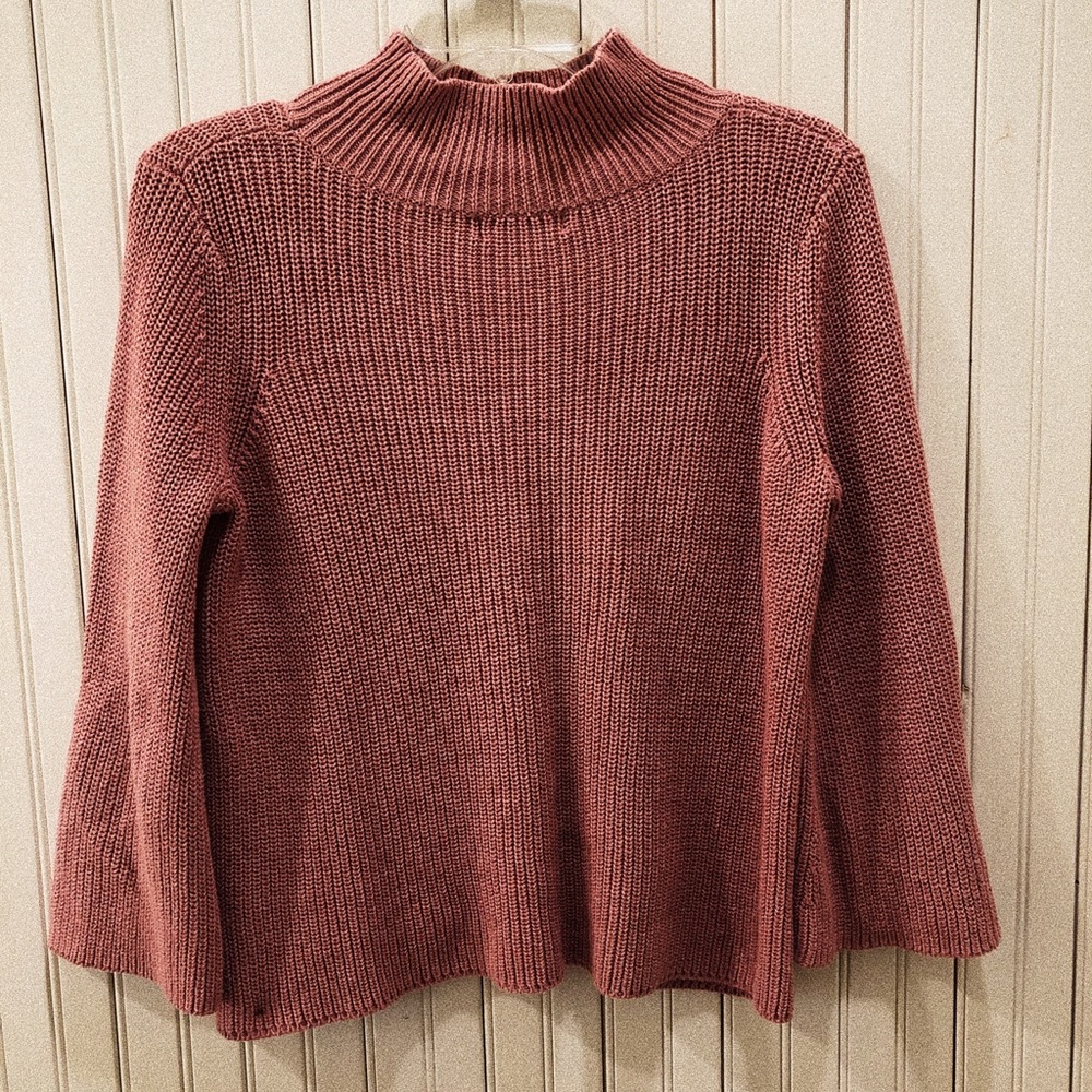 Pink turtleneck